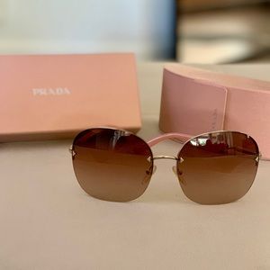 PRADA pink rimless sunglasses